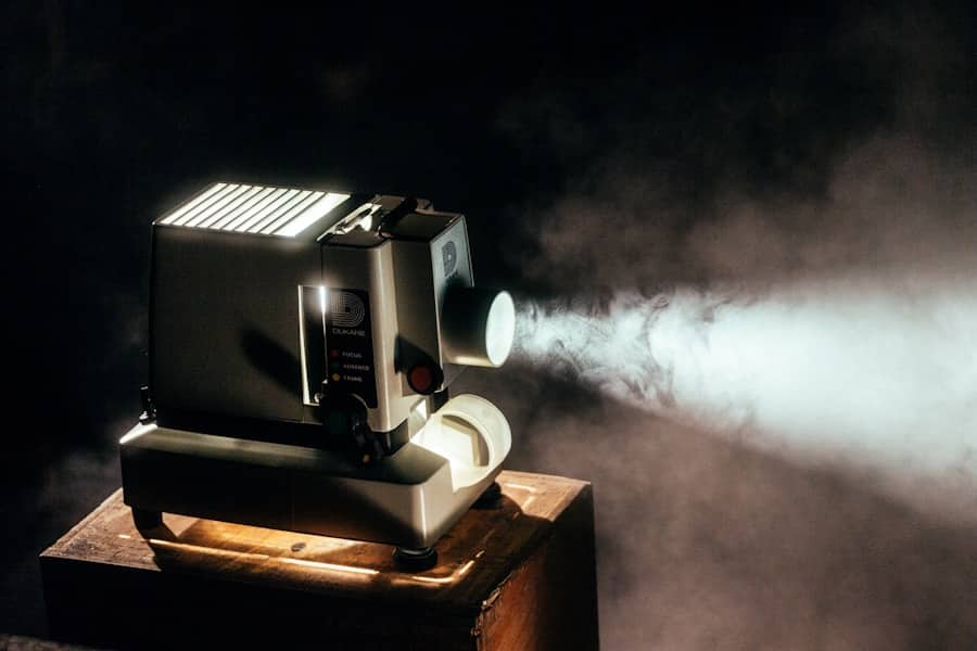 A film projector casting light in a cinema
